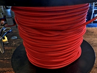 elastiek6mm/200mtr.      rood